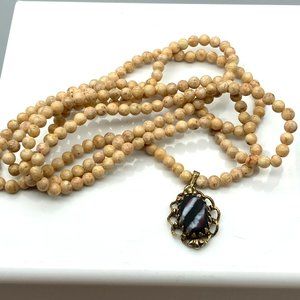 Ornate Framed Zebra Stone Pendant on Natural Jasper Seed Beads Necklace, Vintage
